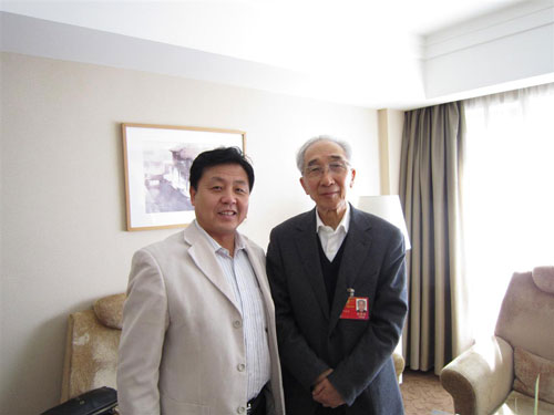 总编辑杨文超与靳尚谊合影