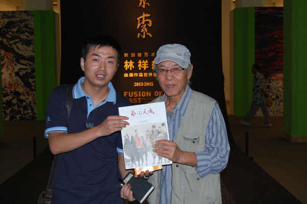画家赵智文与《艺术天成》记者合影