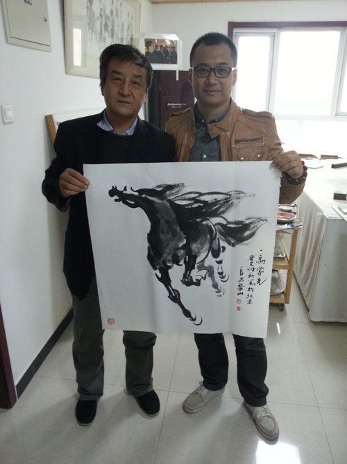 黎山先生与《艺术天成》项目策划经理高伟合影