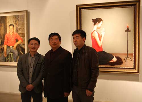 库艺术主编江涛、画家郭援朝与林少云合影