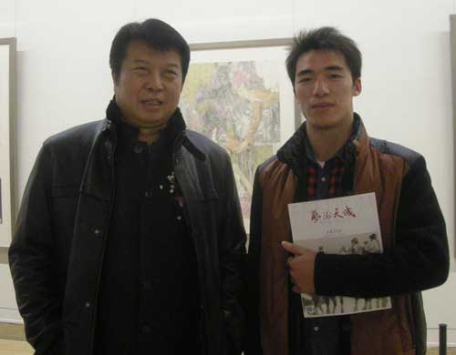 书法艺术家覃志刚与《艺术天成》记者程兵合影