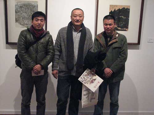 林少云经理、画家李建国、陈迹老师合影
