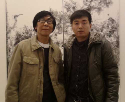 画家陈勤与记者林少云合影