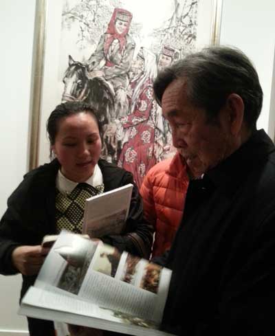 中国美术家协会会员马西光与《艺术天成》通联部主任宁文艳合影