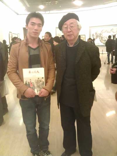 中国美术家协会会员、中国油画学会理事潘世勋与《艺术天成》记者程兵合影
