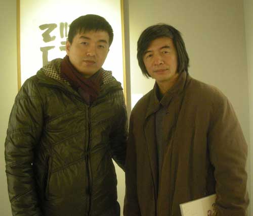 中国美术家协会会员、中国书法家协会会员、福建省美术家协会副主席林容生和《艺术天成》林少云合影