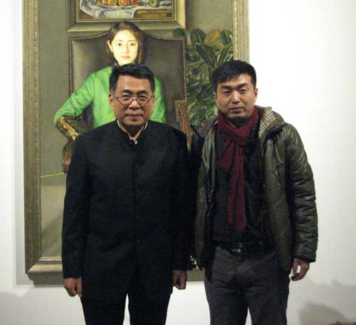 中国油画院院长杨飞云与《艺术天成》市场部经理林少云合影